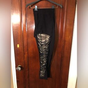 Black leggings with distressing and camo print (torrid size 5 )
